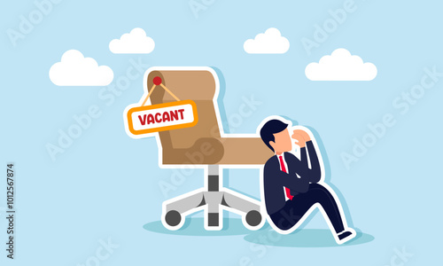 A frustrated and sad businessman sitting under a chair labeled "VACANT," illustrating the company's struggle to find the right and qualified employees.