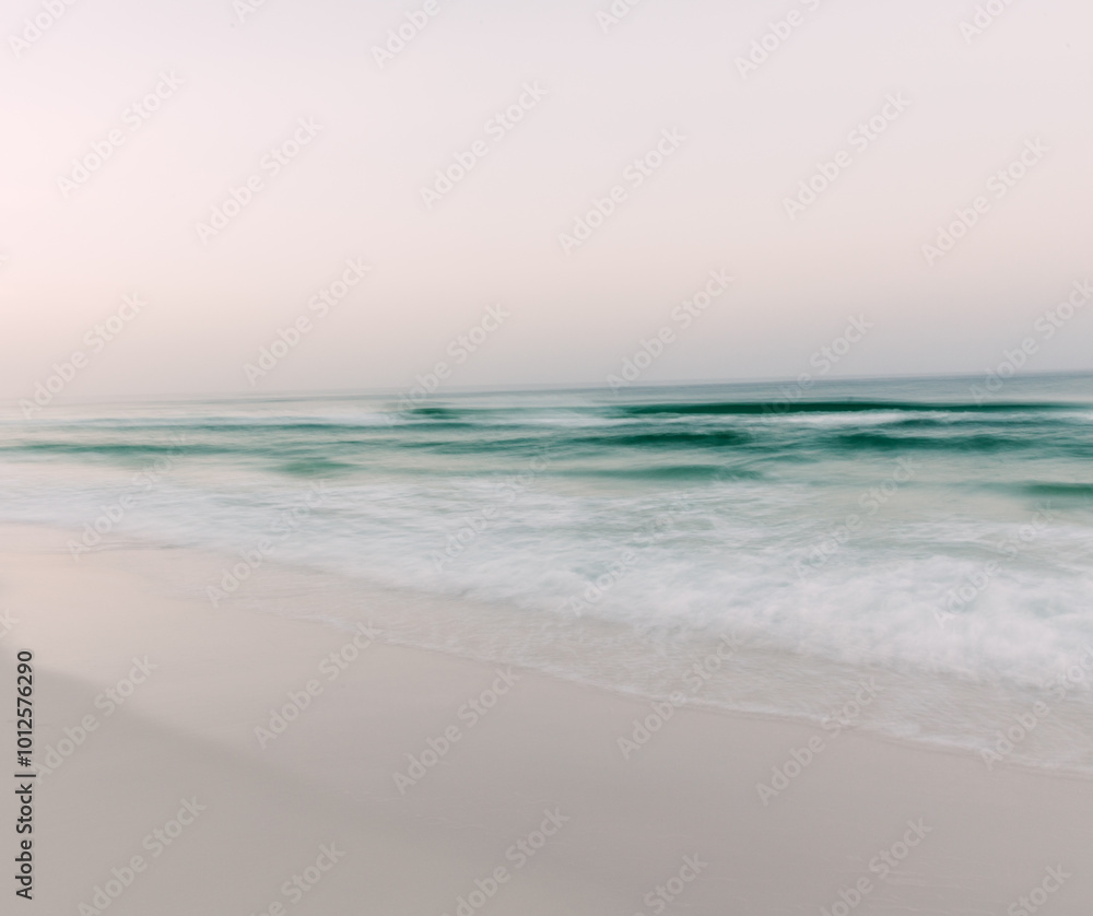 ocean waves and beach at sunrise in Seaside, Florida ocean waves and beach at sunrise in Seaside, Florida
