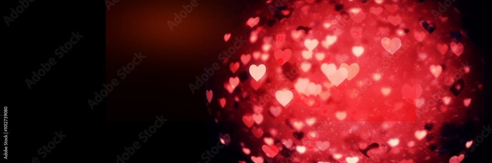 Globe of glowing red heart icons with copy space on black background Globe of glowing red heart icons with copy space on black background
