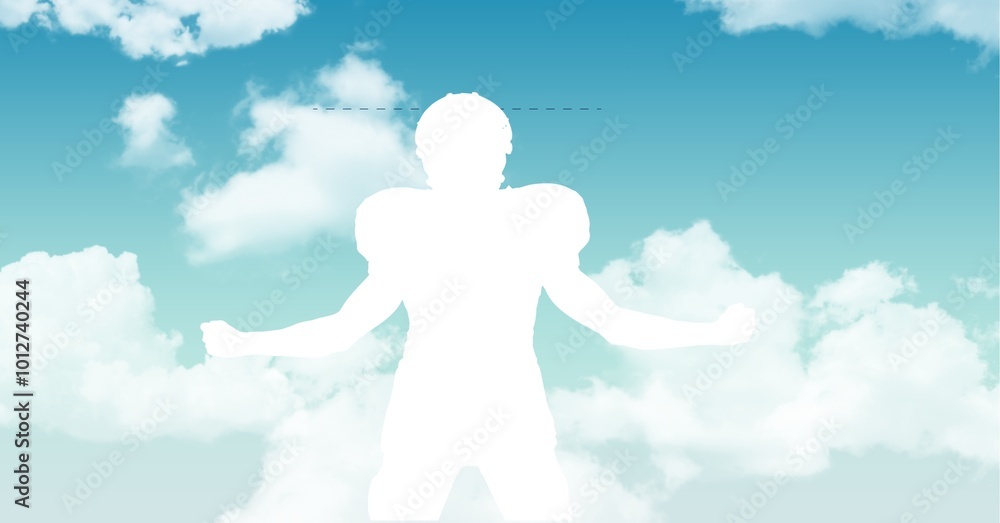 Silhouette of a male rugby player against clouds in the blue sky with copy space Silhouette of a male rugby player against clouds in the blue sky with copy space