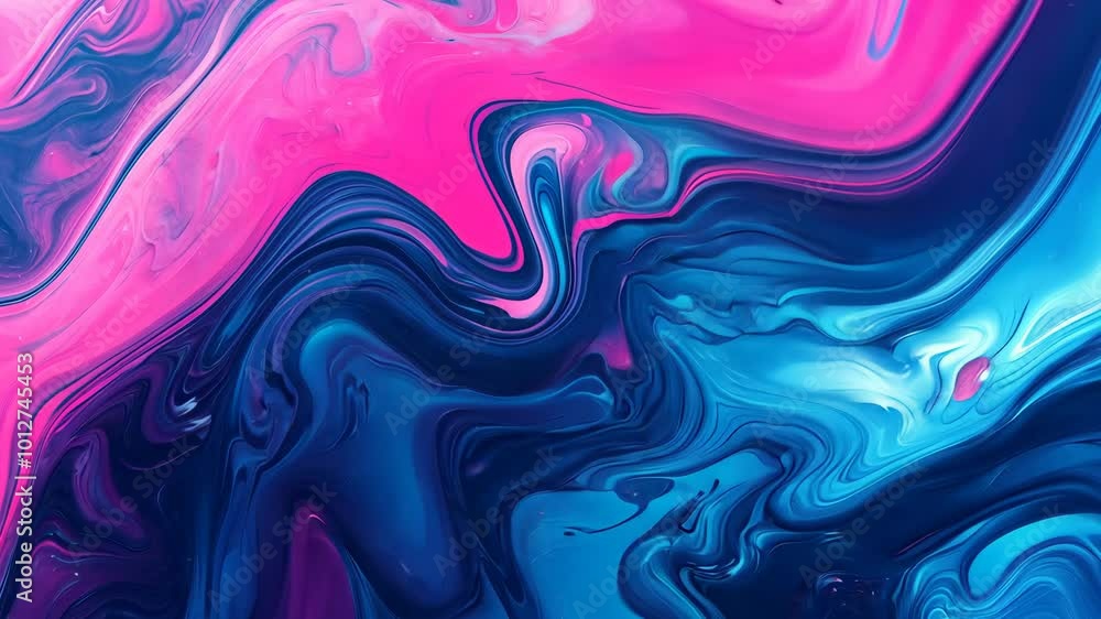 Abstract swirls of pink and blue paint create a mesmerizing pattern Abstract swirls of pink and blue paint create a mesmerizing pattern