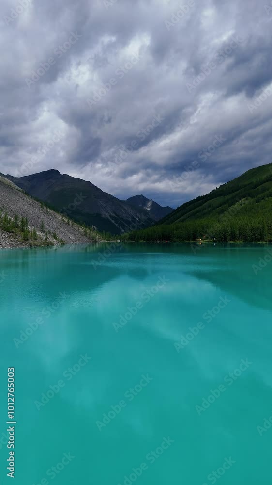drone flight over a mountain lake in Altai drone flight over a mountain lake in Altai