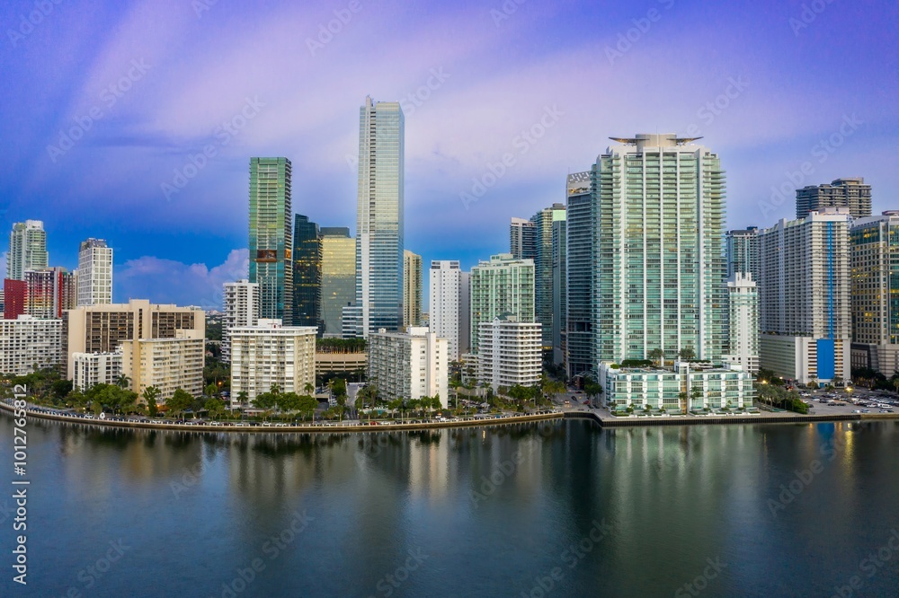 Naklejka premium Downtown waterfront with buildings and condos at sunrise. Miami, Florida, United States.