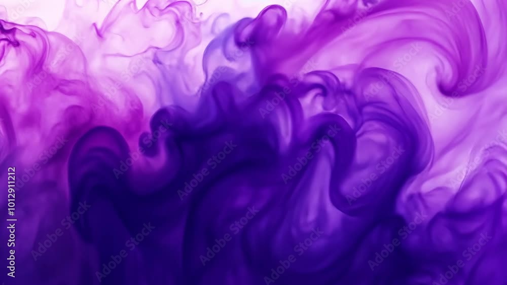 Purple ink swirls and dances in water, creating an abstract pattern of color and movement Purple ink swirls and dances in water, creating an abstract pattern of color and movement