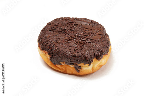 A whole donut without a hole, topped with hardened chocolate glaze and generously covered in chocolate sprinkles. Photographed on a white background.
