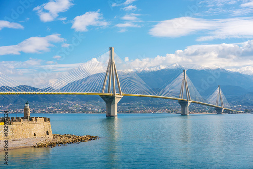 Charilaos Trikoupis lighthouse and bridge between Rio and Antirrio photo