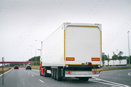 White cargo truck rear side view photo