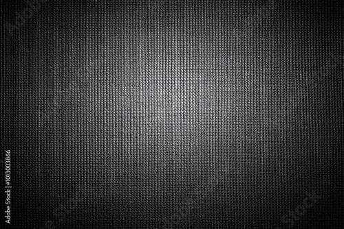 Abstract dark grey wallpaper with canvas texture in forced perspective photo