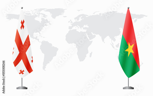 Georgia and Burkina Faso flags for official meeting against background of world map.