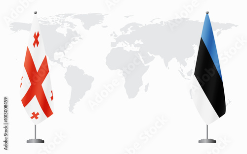 Georgia and Estonia flags for official meeting against background of world map.