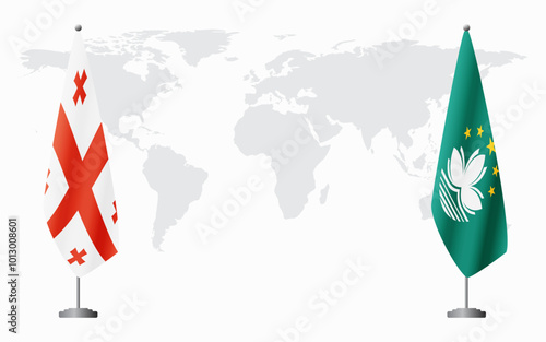 Georgia and Macau flags for official meeting against background of world map.