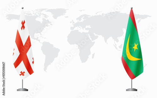 Georgia and Mauritania flags for official meeting against background of world map.