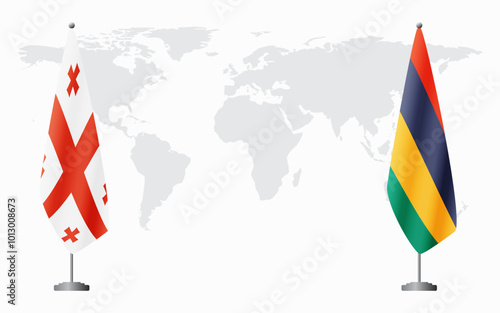 Georgia and Mauritius flags for official meeting against background of world map.