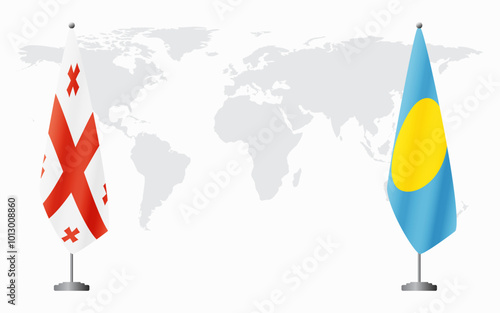Georgia and Palau flags for official meeting against background of world map.