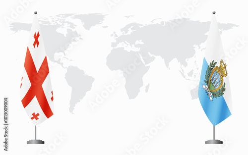 Georgia and San Marino flags for official meeting against background of world map.