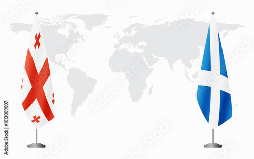 Georgia and Scotland flags for official meeting against background of world map.