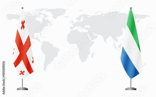 Georgia and Sierra Leone flags for official meeting against background of world map.