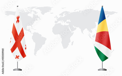 Georgia and Seychelles flags for official meeting against background of world map.