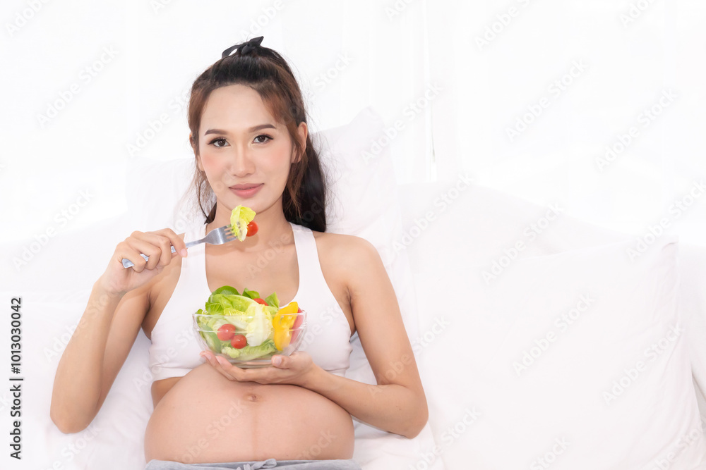 Pregnant healthcare nutrition concept, young Asian pregnancy woman enjoy eating salad for breakfast, maternity female food healthcare motherhood lifestyle, healthy well-being comfort nurturing Pregnant healthcare nutrition concept, young Asian pregnancy woman enjoy eating salad for breakfast, maternity female food healthcare motherhood lifestyle, healthy well-being comfort nurturing