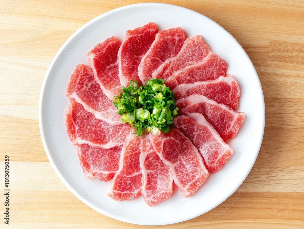Thinly Sliced Shabu Meat Neatly Arranged on White Plate Thinly Sliced Shabu Meat Neatly Arranged on White Plate