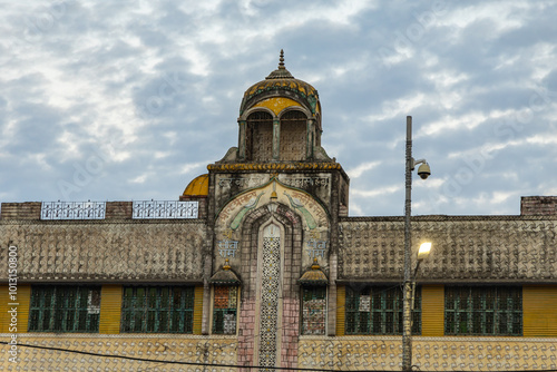 Sacred Hindu temple with its vibrant architecture and dramatic sky at evening from different angle photo