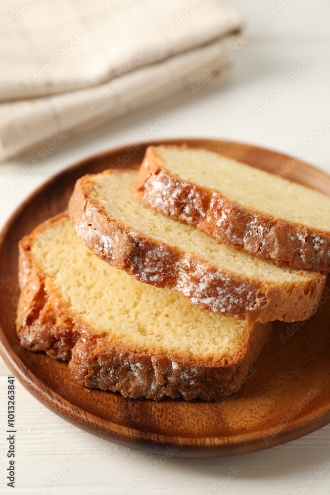 Freshly baked sponge cake on white wooden table, closeup Freshly baked sponge cake on white wooden table, closeup