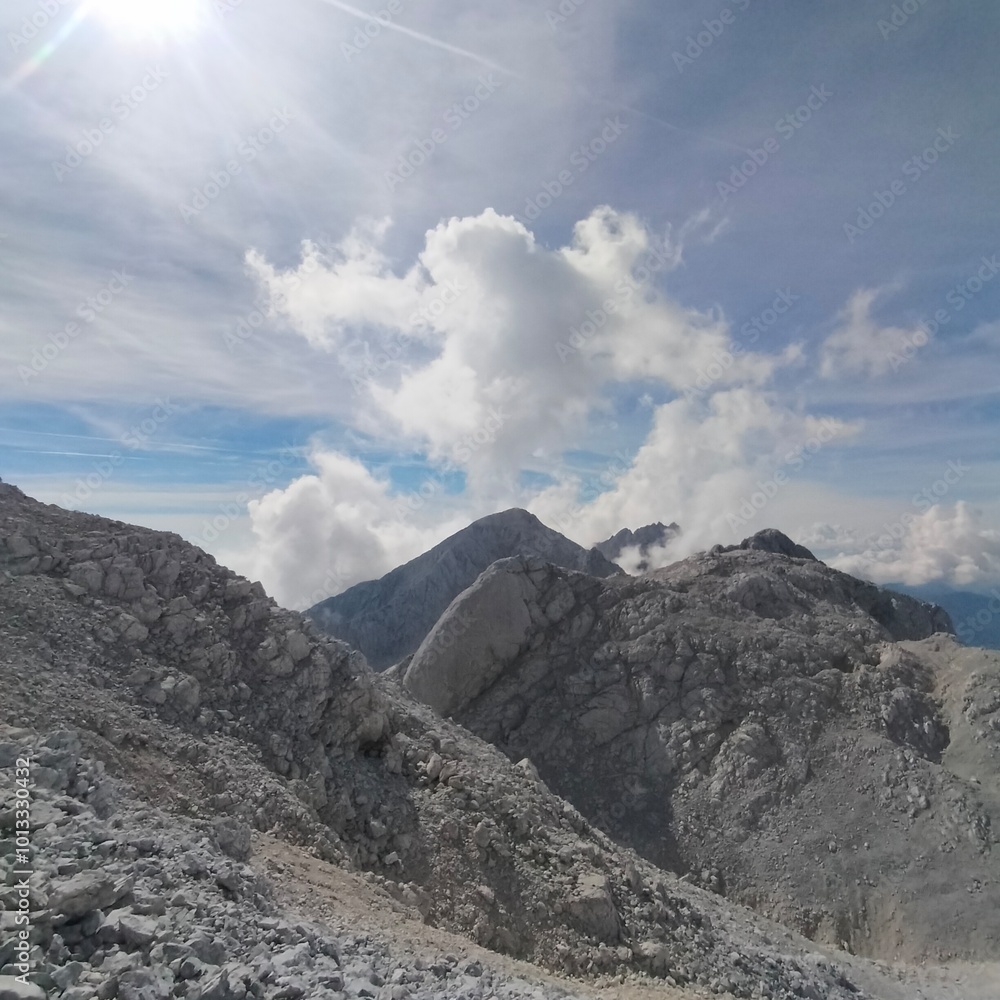 epic mountain peaks with cloudy background epic mountain peaks with cloudy background