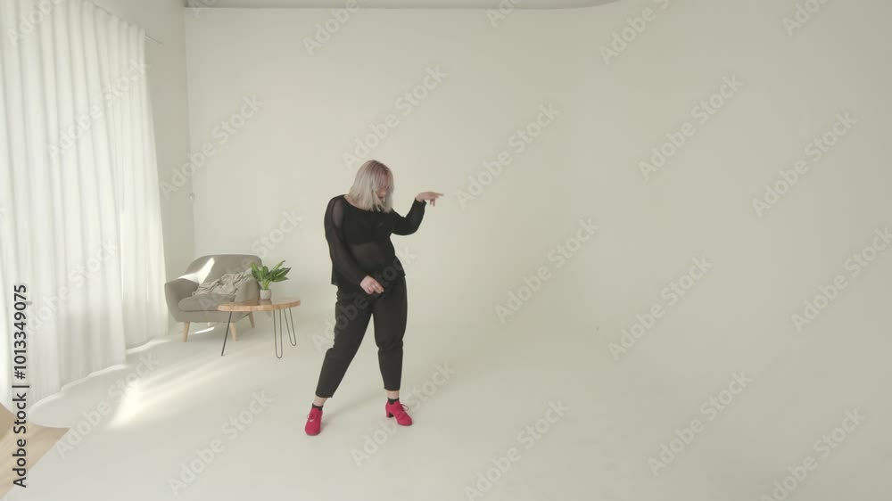 Creative Dance Performance Taking Place in a Minimalist Studio Setting That Inspires Creative Dance Performance Taking Place in a Minimalist Studio Setting That Inspires