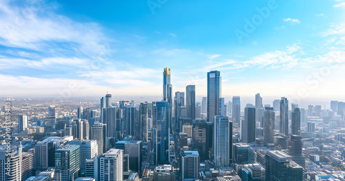 Aerial View of City Skyline and Skyscrapers Under Blue Sky and White Clouds