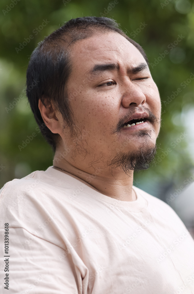 Tired and exhausted Middle Aged Asian man with life problem, concept image for Mental Stress, Sickness, frustration, problem in life, depression or stress management Tired and exhausted Middle Aged Asian man with life problem, concept image for Mental Stress, Sickness, frustration, problem in life, depression or stress management