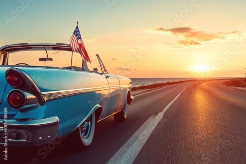 Vintage Convertible Car With American Flag Driving Into Sunset On Coastal Highway