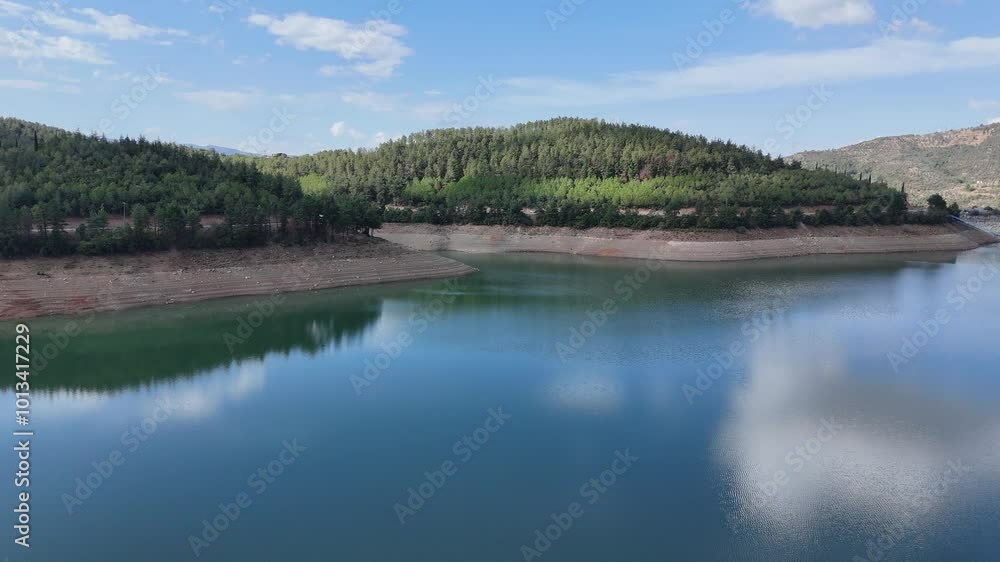 4K aerial drone view. Reflection of the cloud over the lake water. 4K aerial drone view. Reflection of the cloud over the lake water.