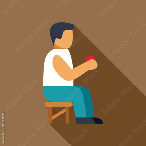 Man is sitting and squeezing a stress ball, exercising his hand and forearm