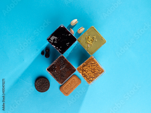 cake in a plastic cup on a blue background 