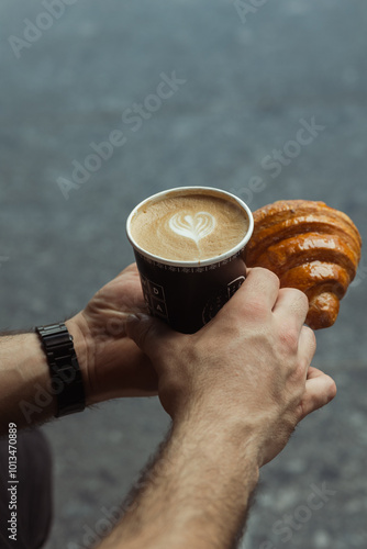 person holding a cup of coffee