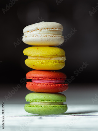 colorful macaroons isolated on black