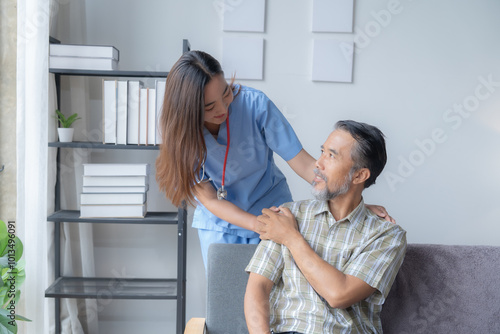 Young nurse comforts an elderly patient at home, showing compassion and empathy, highlighting the importance of trust in healthcare