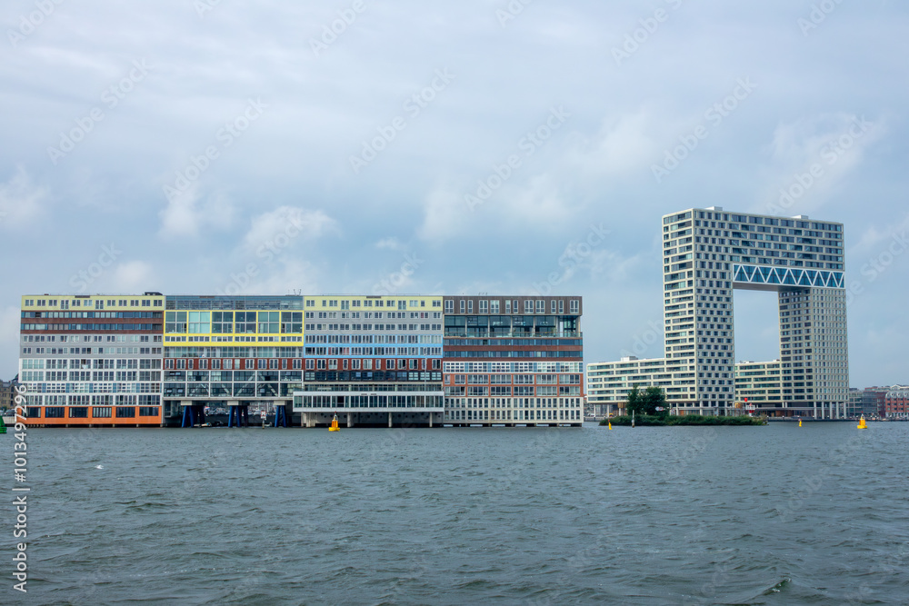 Office Buildings on Stilts near the Banks of the Amstel River Office Buildings on Stilts near the Banks of the Amstel River