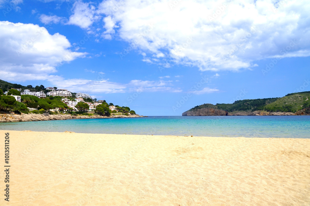 Cala Montgó with white sandy beach Platja de Montgó and beautiful turquoise water of the Mediterranen Sea near L'Escala, Girona, Catalonia, Costa Brava, Spain Cala Montgó with white sandy beach Platja de Montgó and beautiful turquoise water of the Mediterranen Sea near L'Escala, Girona, Catalonia, Costa Brava, Spain