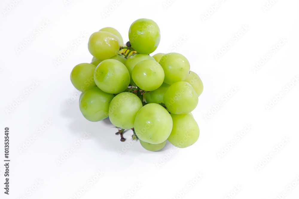 Fresh Green Grapes Cluster on White Background Fresh Green Grapes Cluster on White Background