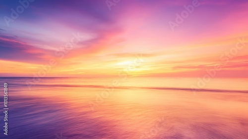 A stunning sunset background with warm tones of orange, pink, and purple, fading into the horizon, creating a peaceful and beautiful atmosphere