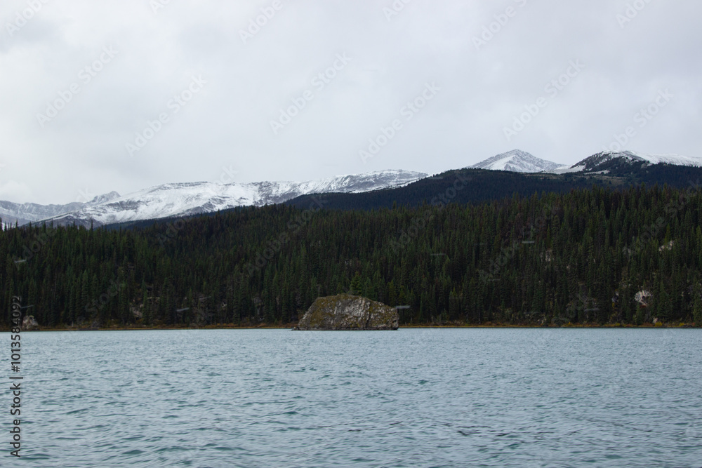 Mountain Maligne full of snow in Autumn, from Maligne Lake, Canada Mountain Maligne full of snow in Autumn, from Maligne Lake, Canada