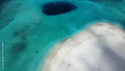 White sand turquoise ocean and deep blue hole, Lagoon