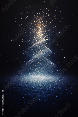 Sparkling christmas tree is shining with gold and silver lights on a dark blue glittery background