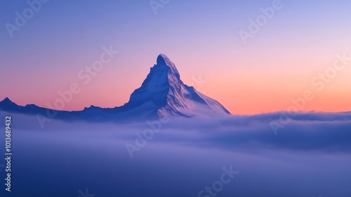 Snow-capped mountain peak at sunrise, serene landscape. Nature beauty and tranquility concept