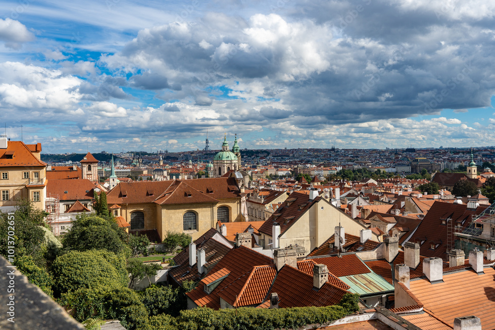 Prague, Czech Republic amazing panoramic from above viewpoint. Beautiful roofs buildings houses towers churches at autumn sunny day. World heritage city. Prague, Czech Republic amazing panoramic from above viewpoint. Beautiful roofs buildings houses towers churches at autumn sunny day. World heritage city.