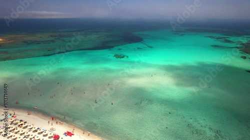 Sardegnia island nature scenery and best beaches. Aerial drone 4k hd video of beautiful Isuledda beach from above. Italy summer holidays photo