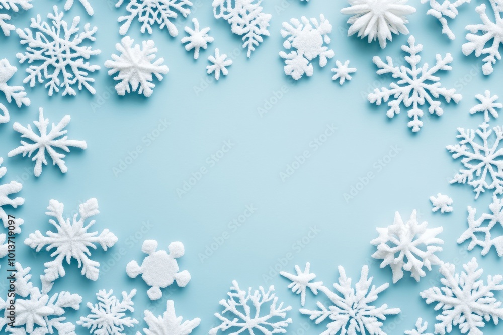 A serene winter wonderland crafted with delicate snowflakes and shimmering ornaments on a tranquil blue backdrop A serene winter wonderland crafted with delicate snowflakes and shimmering ornaments on a tranquil blue backdrop