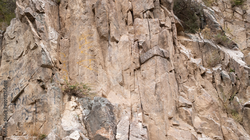 Close-up of weathered rock face showing intricate patterns and textures, geological formation, natural abstract background, climbing concept Close-up of weathered rock face showing intricate patterns and textures, geological formation, natural abstract background, climbing concept