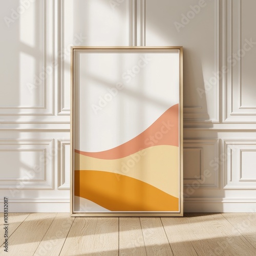 A warm-toned abstract art print rests on a pristine floor in a sunlit room, creating an elegant, inviting modern space.